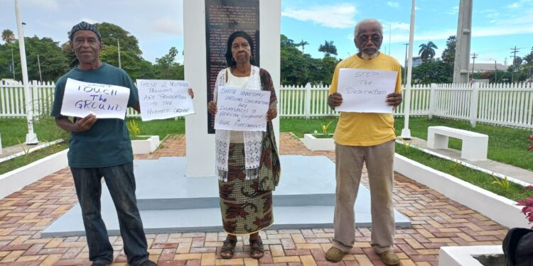 Member of the Coalition for the 1823 Monument staging a protest in July 2025