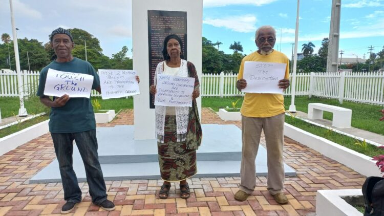 Member of the Coalition for the 1823 Monument staging a protest in July 2025