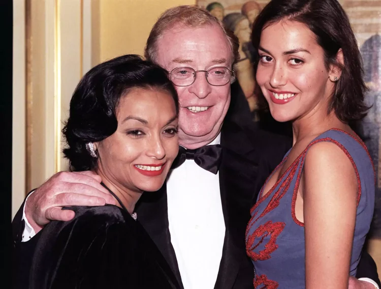 L-R Lady Shakira Baksh Caine, Sir Michael Caine and their daughter (Photo)