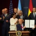 President Donald Trump holds up a newly signed proclamation committing to countering cartel criminal activity at the Shield of the Americas Summit on March 7, 2026, at Trump National Doral Miami in Doral, Florida. | Rebecca Blackwell/AP
