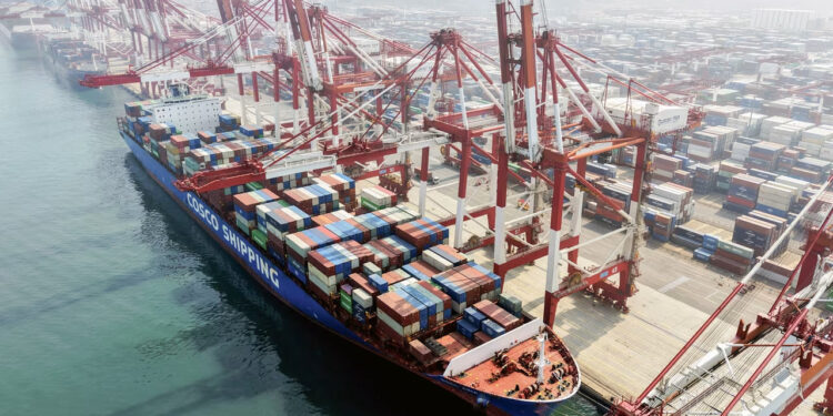 A cargo ship is docked at the foreign trade container terminal of Qingdao Port in China's eastern Shandong province on Wednesday. AFP/Getty Images