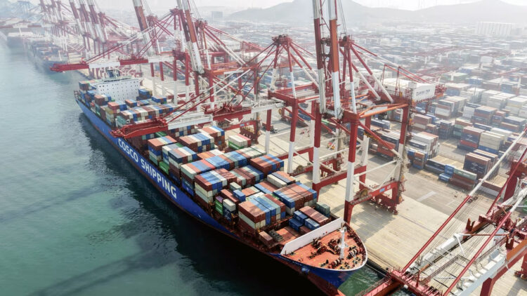 A cargo ship is docked at the foreign trade container terminal of Qingdao Port in China's eastern Shandong province on Wednesday. AFP/Getty Images