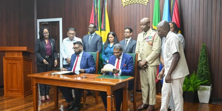 His Excellency Dr Mohamed Irfaan Ali and Prime Minister Terrance Drew, who formally signed the Memoranda of Understanding on agriculture and food security and on government modernisation