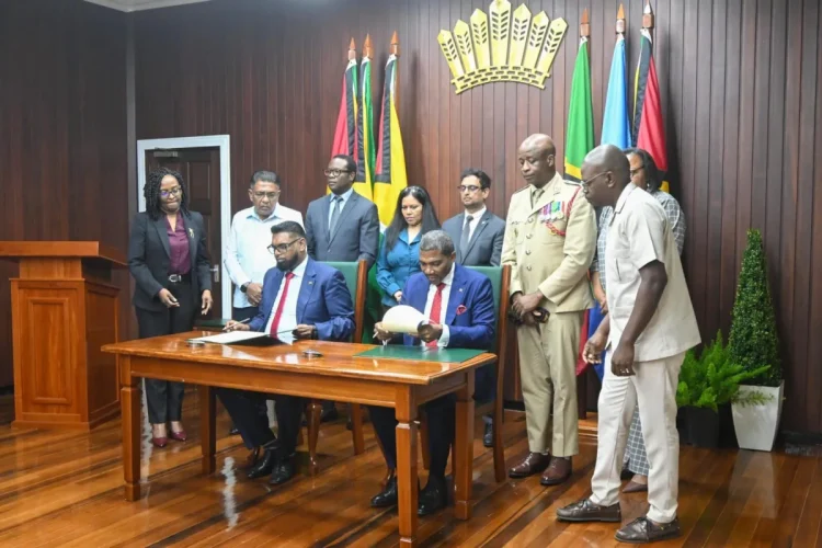 His Excellency Dr Mohamed Irfaan Ali and Prime Minister Terrance Drew, who formally signed the Memoranda of Understanding on agriculture and food security and on government modernisation