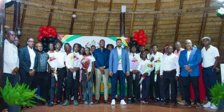 Minister of Culture, Youth and Sport, Charles Ramson Jr, along with Minister within the Ministry of Culture, Youth and Sport, Seven Jacobs and athletes at the cocktail reception