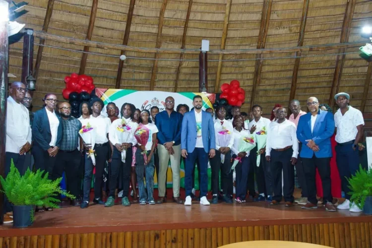 Minister of Culture, Youth and Sport, Charles Ramson Jr, along with Minister within the Ministry of Culture, Youth and Sport, Seven Jacobs and athletes at the cocktail reception