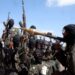 File Photo: Armed al-Shabab fighters ride on pickup trucks outside Mogadishu, Somalia, on December 8, 2008. /CFP
