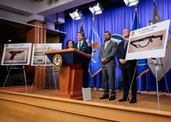 Pictures of the weapons carried by Cole Tomas Allen, the suspect in the shooting incident in Washington at the annual White House Correspondents' Association dinner, are displayed as US Attorney for the District of Columbia Jeanine Pirro, Acting Attorney General Todd Blanche, US Federal Bureau of Investigation (FBI) Director Kash Patel and Assistant Director in Charge (ADIC) of the FBI Washington Field Office Darren Cox take part in a press conference at the US Department of Justice about the shooting incident, in Washington, D.C., US, April 27, 2026. [Photo/Agencies]
