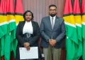 President Dr Mohamed Irfaan Ali with Justice Damone Younge at the swearing ceremony