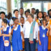 Dr. Carla Barnett, CARICOM Secretary-General shares a light moment with students at the Girls in ICT Day 2026 activities at the CARICOM Secretariat, Thursday, 23 April 2026