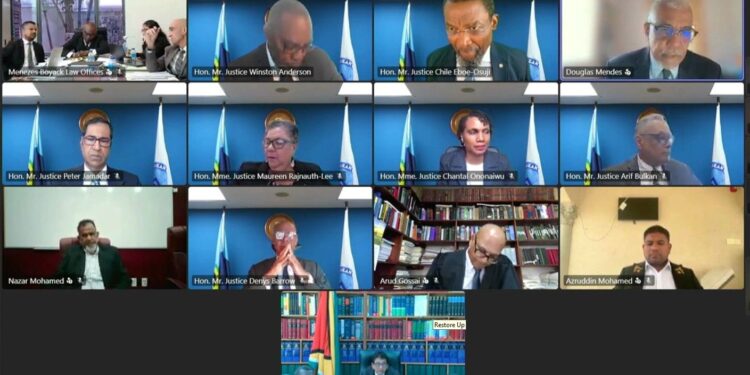 A screenshot from the livestream of the CCJ Hearing of the Application – N. Mohamed and A. Mohamed v Minister of Home Affairs, O. Walrond and others, on Tuesday 21 April 2026. [Image courtesy Caribbean Court of Justice YouTube Channel]