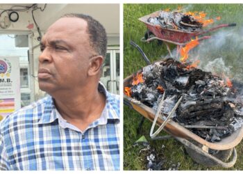 Stanley Paul and the wheelbarrows he burnt materials on the CLC compound