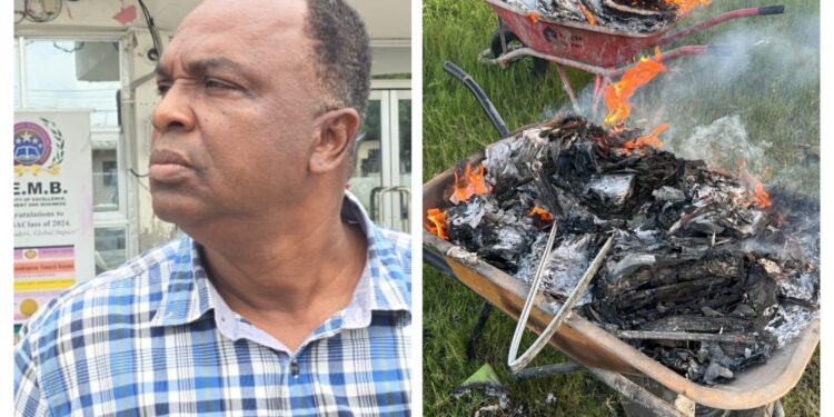 Stanley Paul and the wheelbarrows he burnt materials on the CLC compound