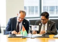 Senior Minister in the Office of the President with responsibility for Finance, Dr Ashni Singh, alongside International Finance Corporation Vice President for Europe, Latin America and the Caribbean, Alfonso García Mora, during the signing of the agreement