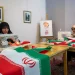 Volunteers sew Iranian flags to distribute across the city for free in Tehran, Iran, on Sunday. According to the team's manager, up to 5,000 flags are distributed daily.
Majid Saeedi/Getty Images