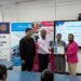 From the Left-Interact Club of St. Stanislaus College Advisor Emanuel
Narine, Rotary Club of Georgetown Central President Lloyd David,
Charter President Interact Club of St. Stanislaus College, Makeena Howard,
Rotaract Club of Georgetown President Harrinarine Balram