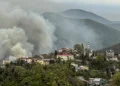 Smoke rises above buildings following a recent drone attack on the Tuapse oil refinery in Tuapse, Krasnodar region on April 29, 2026, amid the ongoing Russian-Ukrainian conflict. Stringer/AFP/Getty Images