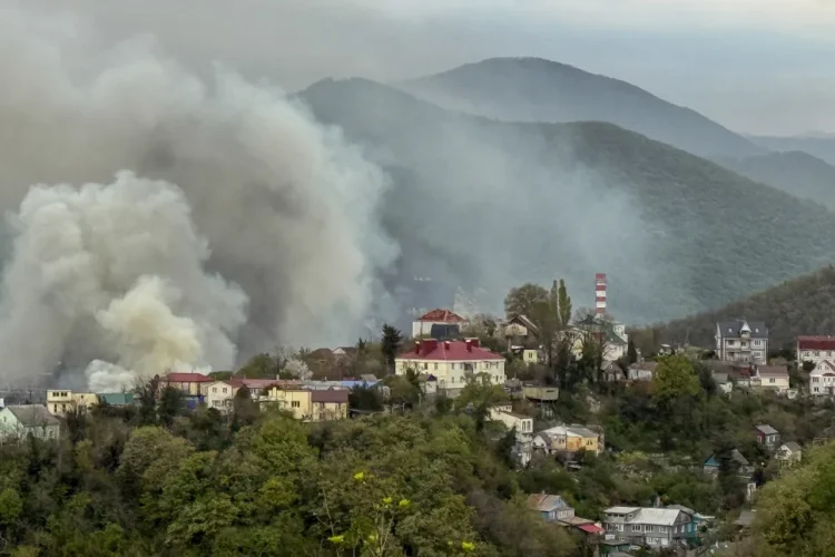 Smoke rises above buildings following a recent drone attack on the Tuapse oil refinery in Tuapse, Krasnodar region on April 29, 2026, amid the ongoing Russian-Ukrainian conflict. Stringer/AFP/Getty Images
