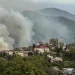 Smoke rises above buildings following a recent drone attack on the Tuapse oil refinery in Tuapse, Krasnodar region on April 29, 2026, amid the ongoing Russian-Ukrainian conflict. Stringer/AFP/Getty Images
