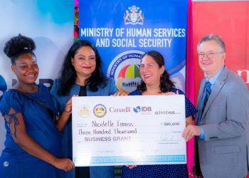 Ministry of Human Services and Social Security Dr Vindhya Persaud, alongside IDB Country Representative Lorena Salazar and Political Counsellor at the High Commission of Canada, Daniel Bood, handing over the grant