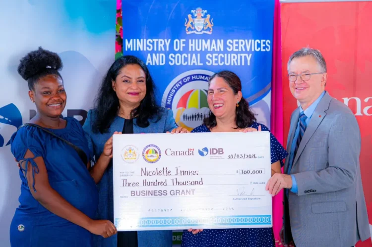 Ministry of Human Services and Social Security Dr Vindhya Persaud, alongside IDB Country Representative Lorena Salazar and Political Counsellor at the High Commission of Canada, Daniel Bood, handing over the grant