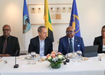 Tourism Minister Edmund Bartlett address members of the board of the Inter-American Development Bank (IDB) at a luncheon hosted in his honour in Washington, D.C. April 7, 2026. From left are Professor Lloyd Waller, Executive Vice President of the IDB Jordan Schwartz and Ms Christina Edwards Director of tourism and International Trade relationship. | Derrick Scott Photo