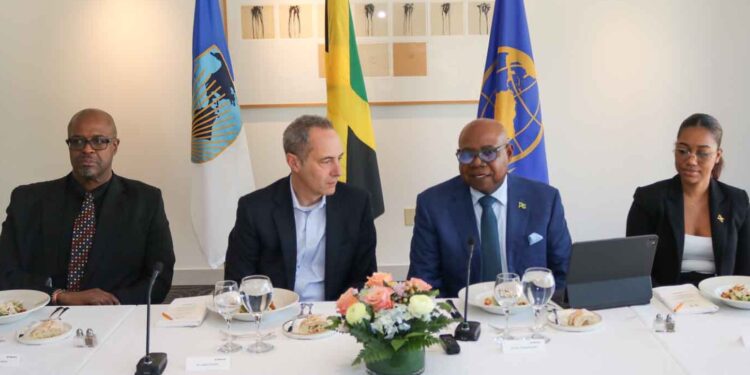 Tourism Minister Edmund Bartlett address members of the board of the Inter-American Development Bank (IDB) at a luncheon hosted in his honour in Washington, D.C. April 7, 2026. From left are Professor Lloyd Waller, Executive Vice President of the IDB Jordan Schwartz and Ms Christina Edwards Director of tourism and International Trade relationship. | Derrick Scott Photo