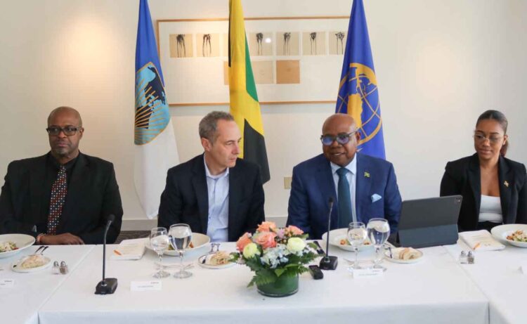Tourism Minister Edmund Bartlett address members of the board of the Inter-American Development Bank (IDB) at a luncheon hosted in his honour in Washington, D.C. April 7, 2026. From left are Professor Lloyd Waller, Executive Vice President of the IDB Jordan Schwartz and Ms Christina Edwards Director of tourism and International Trade relationship. | Derrick Scott Photo