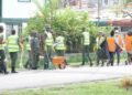 Members of the Guyana Defence Force cleaning the streets of Georgetown