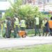 Members of the Guyana Defence Force cleaning the streets of Georgetown