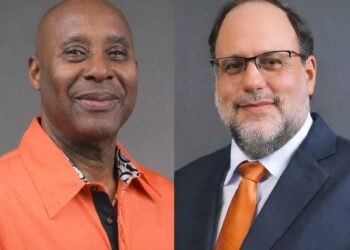 Senator Dennis Gordon (left) and PNP President Mark Golding (right)