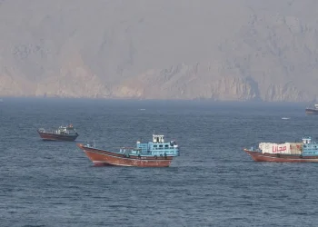 Ships and tankers in the Strait of Hormuz off the coast of Musandam, Oman, April 18, 2026. Reuters.