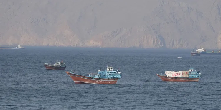 Ships and tankers in the Strait of Hormuz off the coast of Musandam, Oman, April 18, 2026. Reuters.
