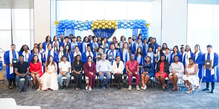 Minister of Health Dr Frank Anthony and training facilitators alongside graduates
