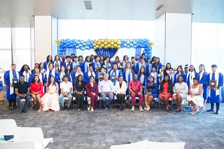 Minister of Health Dr Frank Anthony and training facilitators alongside graduates