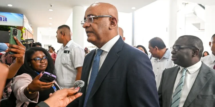 Vice President Dr Bharrat Jagdeo engaging reporters at the Arthur Chung Conference Centre on Monday