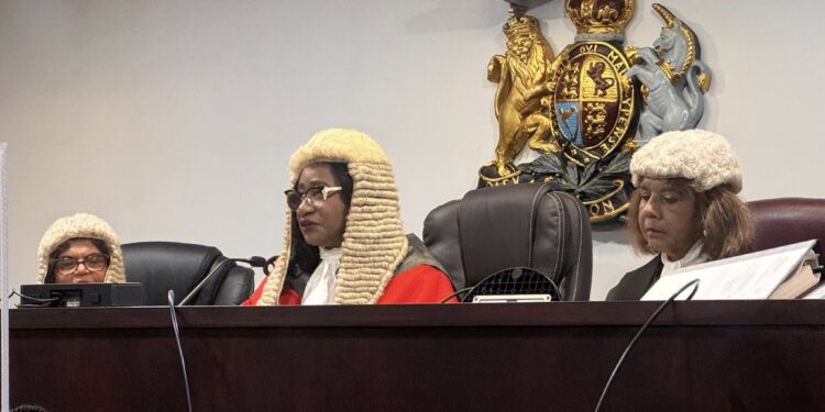 Justice Yonette Cummings-Edwards, Chief Justice of the Turks and Caicos Islands (centre)
