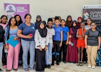 Girls' Chess Camp participants with coaches