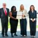 ICECP Program Kenisha Headley receiving certificate from IOC President Kirsty Coventry