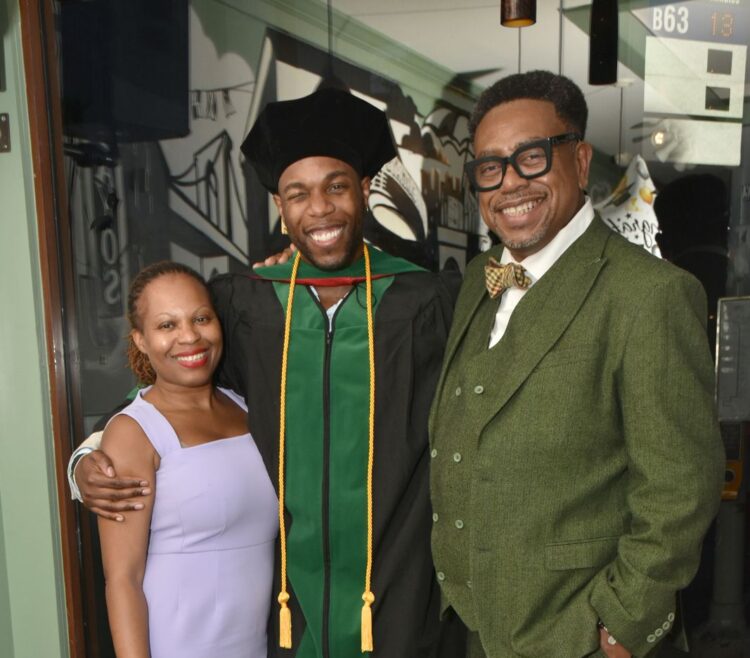 Dr. Madiba Blackman flanked by his mother, Marie Blackman and father Dr. Terrence Blackman