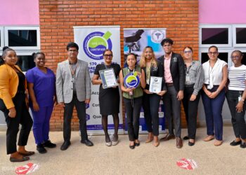 Representatives from Georgetown Public Hospital Corporation pose with the GYS 170 Certificate and Plaque
