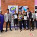 Representatives from Georgetown Public Hospital Corporation pose with the GYS 170 Certificate and Plaque