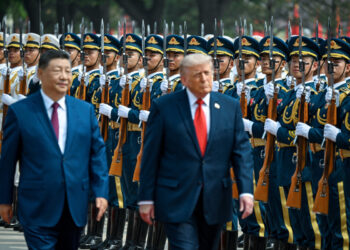 U.S. President Donald Trump reviews the troops with the President of the People’s Republic of China Xi Jinping, in Beijing, China, May 14, 2026, during a trip focused on trade, regional security, and strengthening bilateral ties between the world’s two largest economies. Kenny Holston/Pool via REUTERS