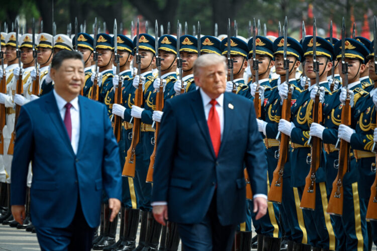 U.S. President Donald Trump reviews the troops with the President of the People’s Republic of China Xi Jinping, in Beijing, China, May 14, 2026, during a trip focused on trade, regional security, and strengthening bilateral ties between the world’s two largest economies. Kenny Holston/Pool via REUTERS