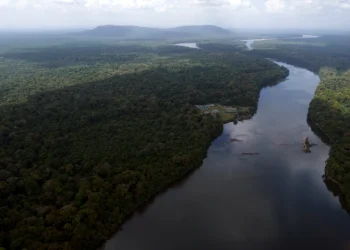 The Essequibo River flows through Kurupukari crossing in Guyana, Nov. 19, 2023. (AP Photo/Juan Pablo Arraez, File)