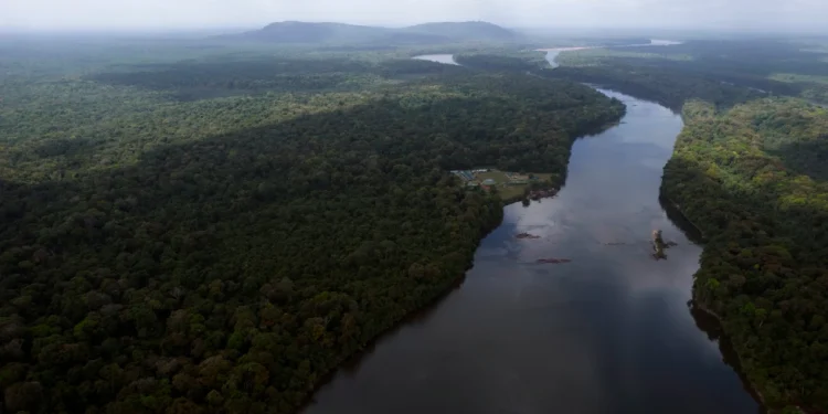 The Essequibo River flows through Kurupukari crossing in Guyana, Nov. 19, 2023. (AP Photo/Juan Pablo Arraez, File)