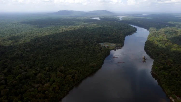 The Essequibo River flows through Kurupukari crossing in Guyana, Nov. 19, 2023. (AP Photo/Juan Pablo Arraez, File)