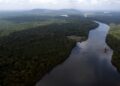 FILE - The Essequibo River flows through Kurupukari crossing in Guyana, Nov. 19, 2023. (AP Photo/Juan Pablo Arraez, File)