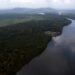 FILE - The Essequibo River flows through Kurupukari crossing in Guyana, Nov. 19, 2023. (AP Photo/Juan Pablo Arraez, File)