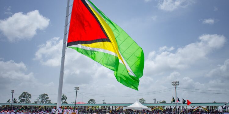 Members of the Guyana Defence Force hoisting the Golden Arrow Head (DPI photo, Feb 20, 2020)